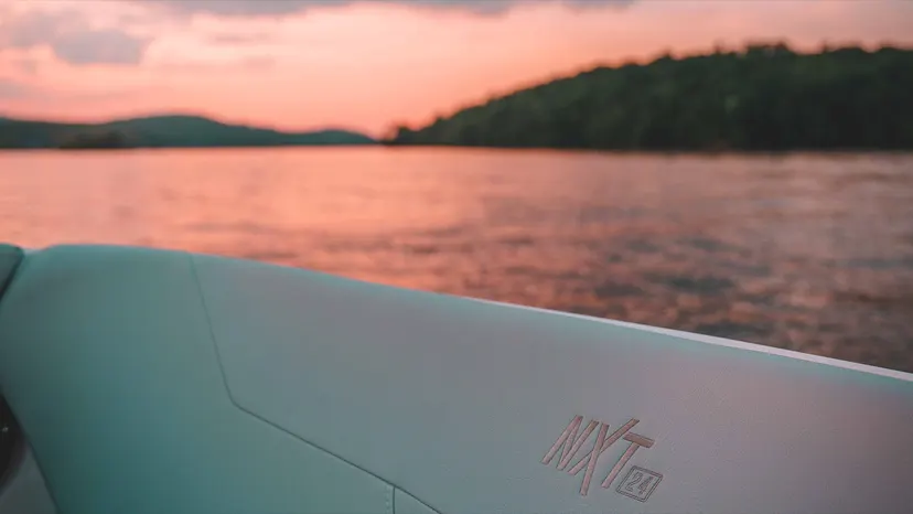 MasterCraft NXT24 seating with a sunset view across Candlewood Lake.