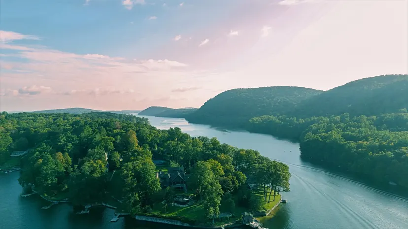 Aerial view of a bay and shoreline homes on Candlewood Lake in New Milford.